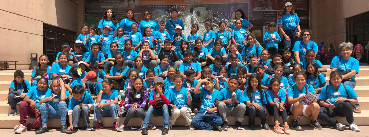 Group of children and volunteers