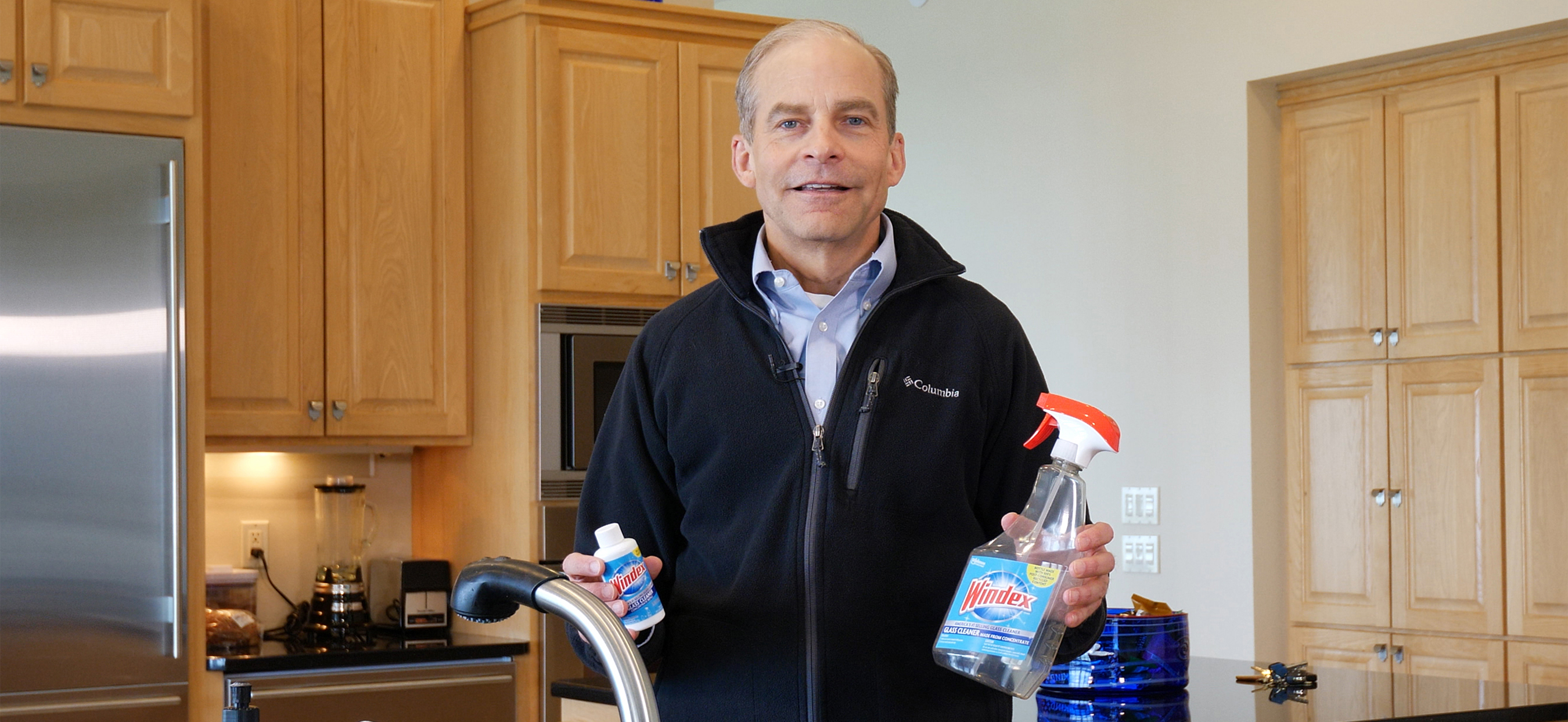 Fisk Johnson holding Windex bottles