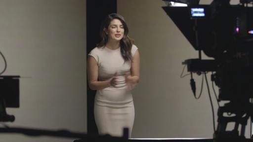 Women talking in front of camera