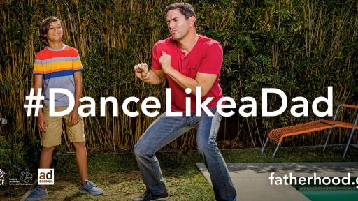 Son watching dad dance