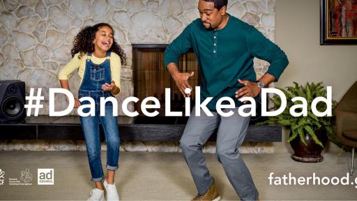 Daughter dancing with her dad