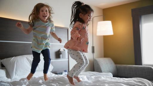 Three woman having drinks at a bar