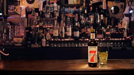 Seagram&rsquo;s 7 Crown Whiskey paired with lemon-lime soda, on a bar