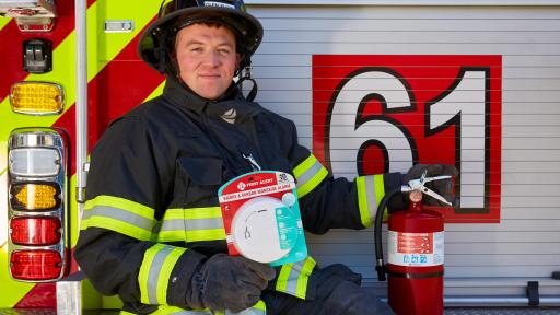 Firefighter holding product