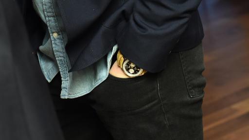 Hand in pocket, watch on wrist