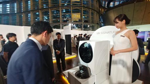 Man looking at LG washer