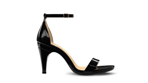 “Pashionista” features a classic silhouette updated for the modern woman. Soft patent leather complements a simple and chic design with an adjustable ankle strap and gold buckle.