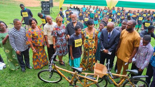 ABCF&rsquo;s &ldquo;500th Bicycle&rdquo; event speakers present bamboo bicycles to individual students, recently, in Accra. Speakers included: Mr Daniel Lawer Agudey, head teacher, Ningo Senior High School (Second from left); Ms Beatrix Ollenu, Ningo-Prampram School District Director of Education(third from left); Mr Peter Djan, Head teacher, Prampram Senior High School(fourth from left); Ms Patricia Marshall Harris, executive director, ABCF(fifth from left); Mr A.Bruce Crawley, chairman, ABCF(sixth from left); Hon. Elizabeth K. T. Sackey, Deputy Regional Minister, Greater Accra(center); and Mr. Carl Nelson, COO, Ghana Investment Promotion Centre(third from right), with bamboo bicycle recipient.