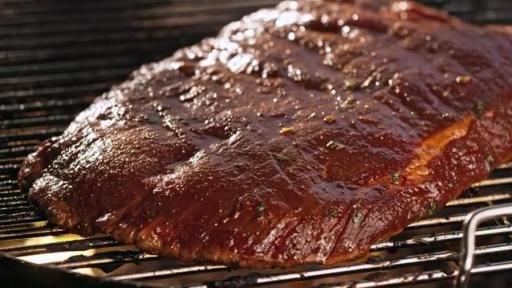 Slab of beef on a grill