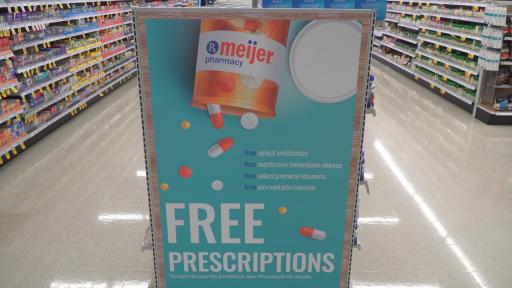 Free Prescription Drug Program banner in an aisle