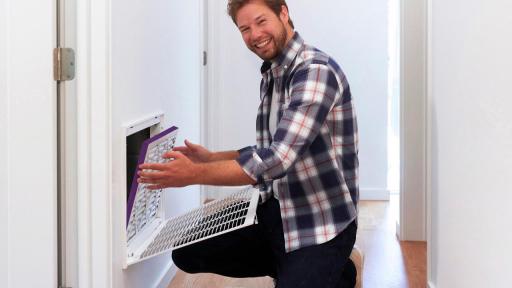 Man replacing air filters
