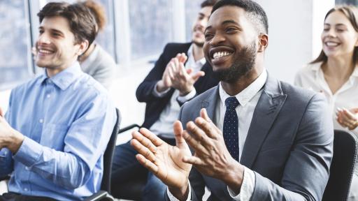 Five people attending a seminar