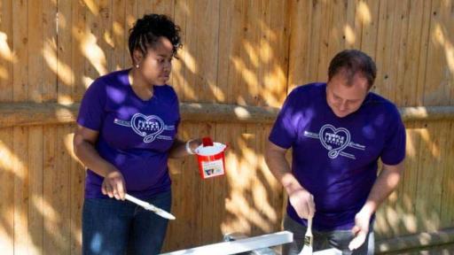 Volunteers from Purina complete a painting project at a shelter in Auburn, ME. The team helped create pet-friendly spaces including kennel areas and cat bridges to allow people and pets to bond together in safe, private areas.