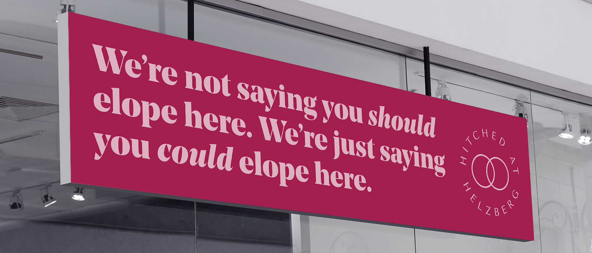 Sign in front of store that reads: Elope here