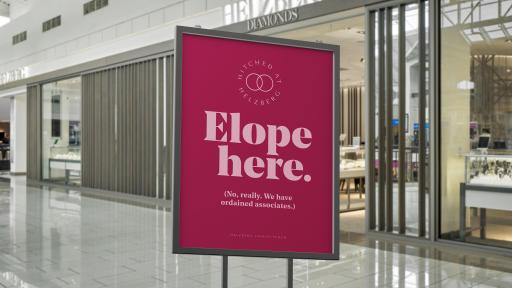 Pink sign that reads: Elope here.