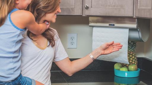 A mother and daughter using the Innovia Paper Towel Dispenser