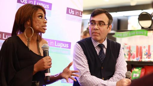 Woman with microphone talking to a man