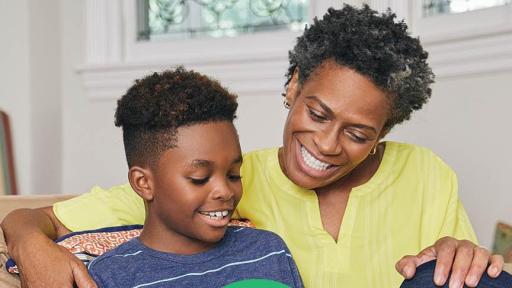 Grandmother sitting with her young grandson