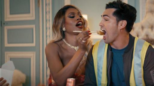 Laverne Cox and Toddy Smith enjoy Smirnoff Raspberry Rosé Seltzer alongside Chinese takeout.