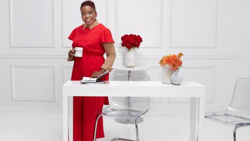 Woman standing behind a desk