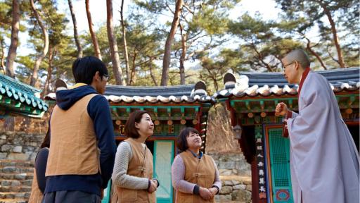 A monk and Templestay participants talk