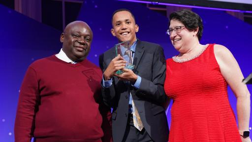 Achilles Kid, Diego Lacayo, is honored during the 2019 Achilles International Gala.