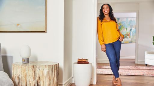 A woman leaning against a wall