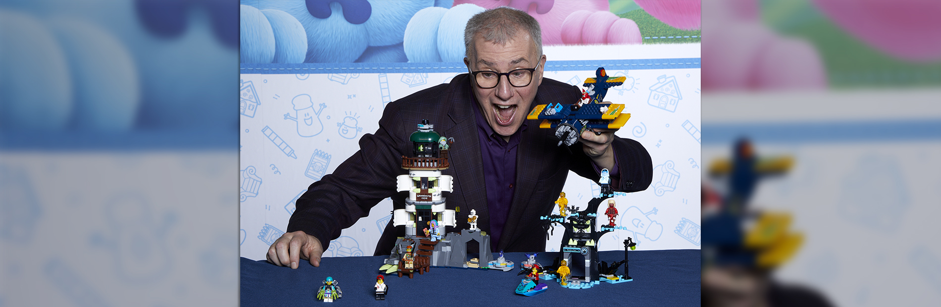 Toy Guy playing with a toy airplane