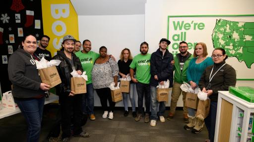Despite a snowy day, Boston winners and Cricket employees gathered together to enjoy the holiday season and collect prizes.