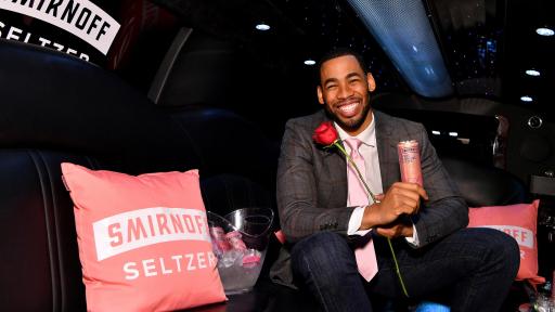 Mike Johnson holding a rose