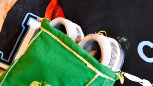 Crown Royal Regal Apple partners with designer, creator and collaborator Joe Freshgoods as Creative Director to curate limited-edition merch experience including a Crown Royal Regal Apple Bag re-imagined as a sneaker bag.