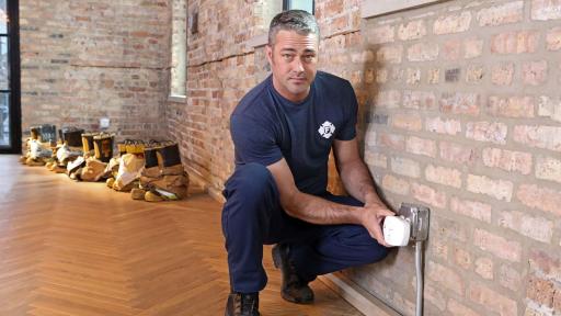 Man testing a carbon monoxide alarm