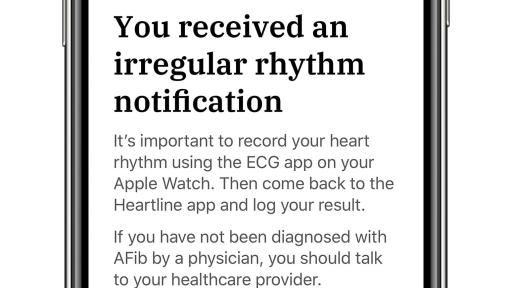 iPhone11 with an irregular rhythm notification on screen from the Heartline app