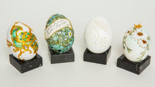 Lady Nancy Reagan a bejeweled egg with opals, turquoise, emeralds and lapis lazuli in royal blue.