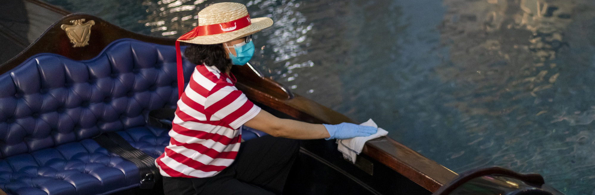 Person wiping down a boat
