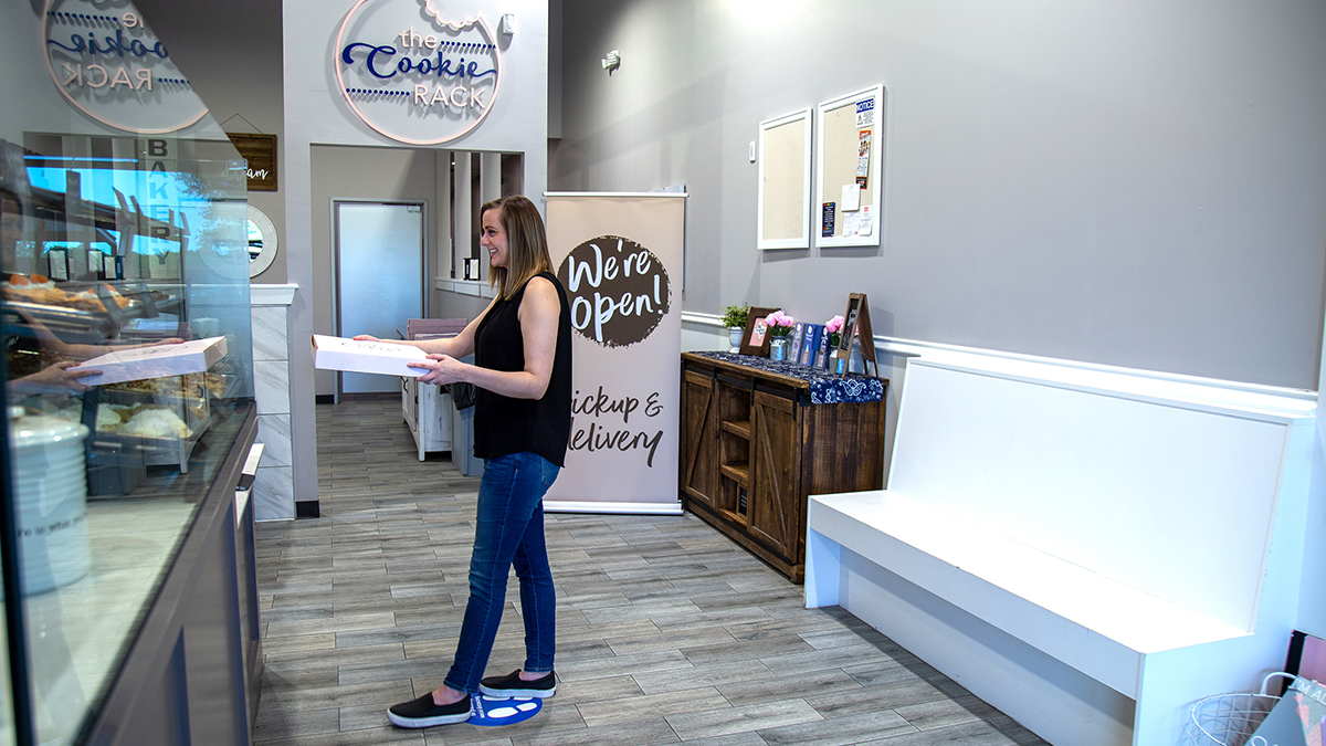 Customer practicing social distancing while standing in line