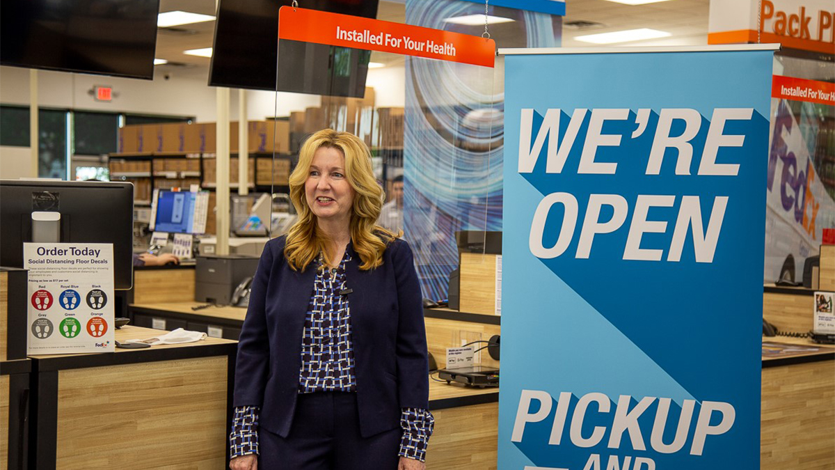 Kim Dixon standing in front of a counter