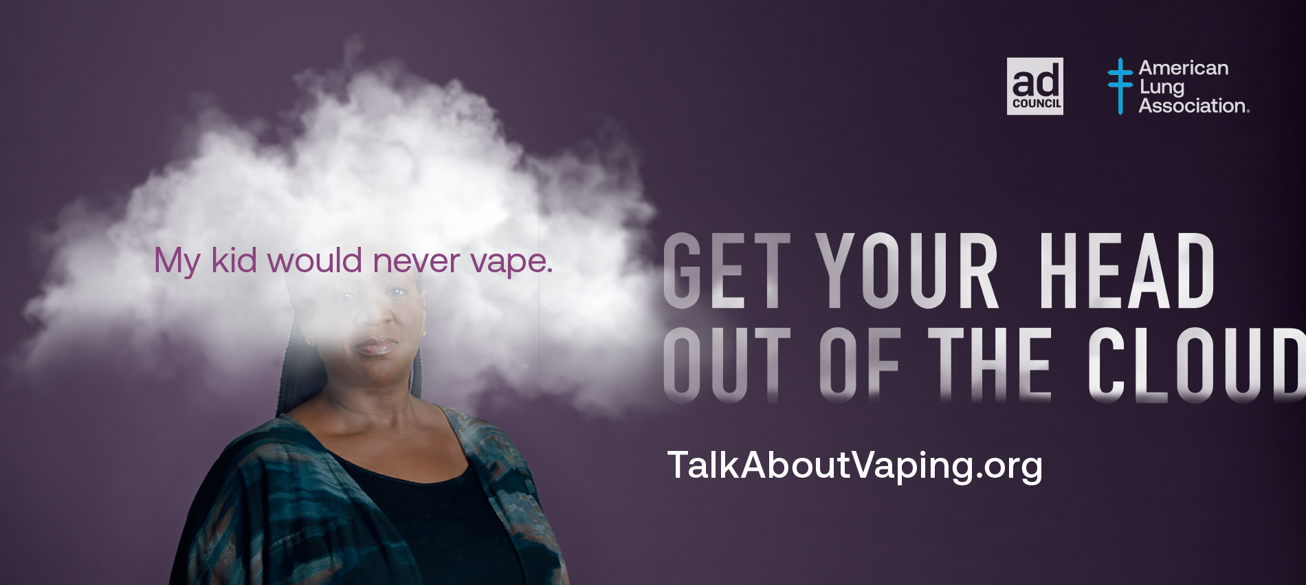 Woman with head in cloud of smoke