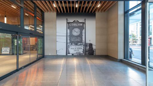 West Block retail lobby featuring wood ceiling salvaged from the old Queen&rsquo;s Wharf