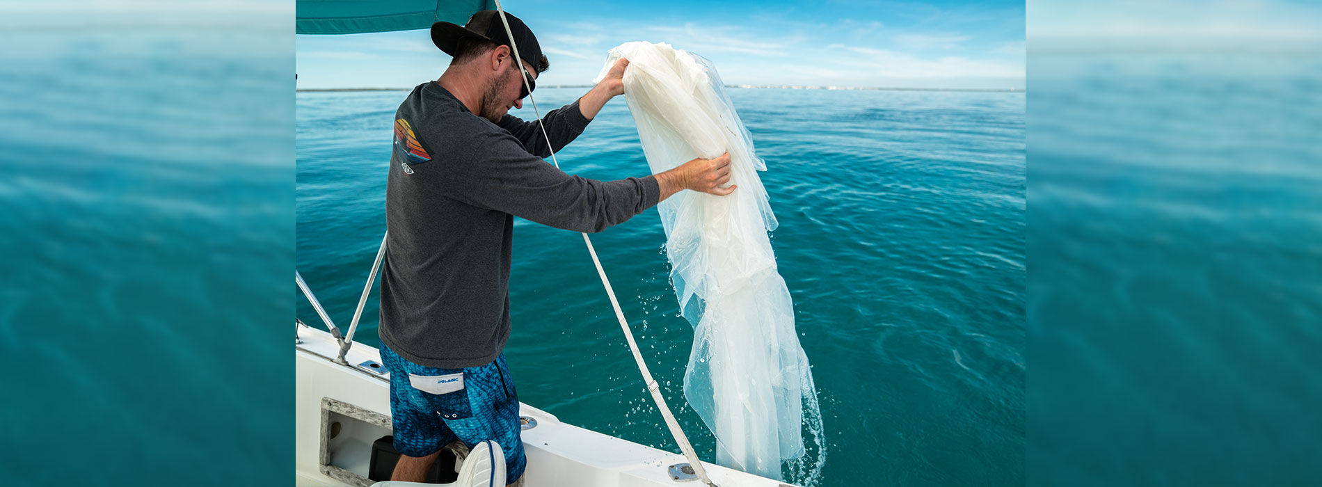 Man with drone at sea