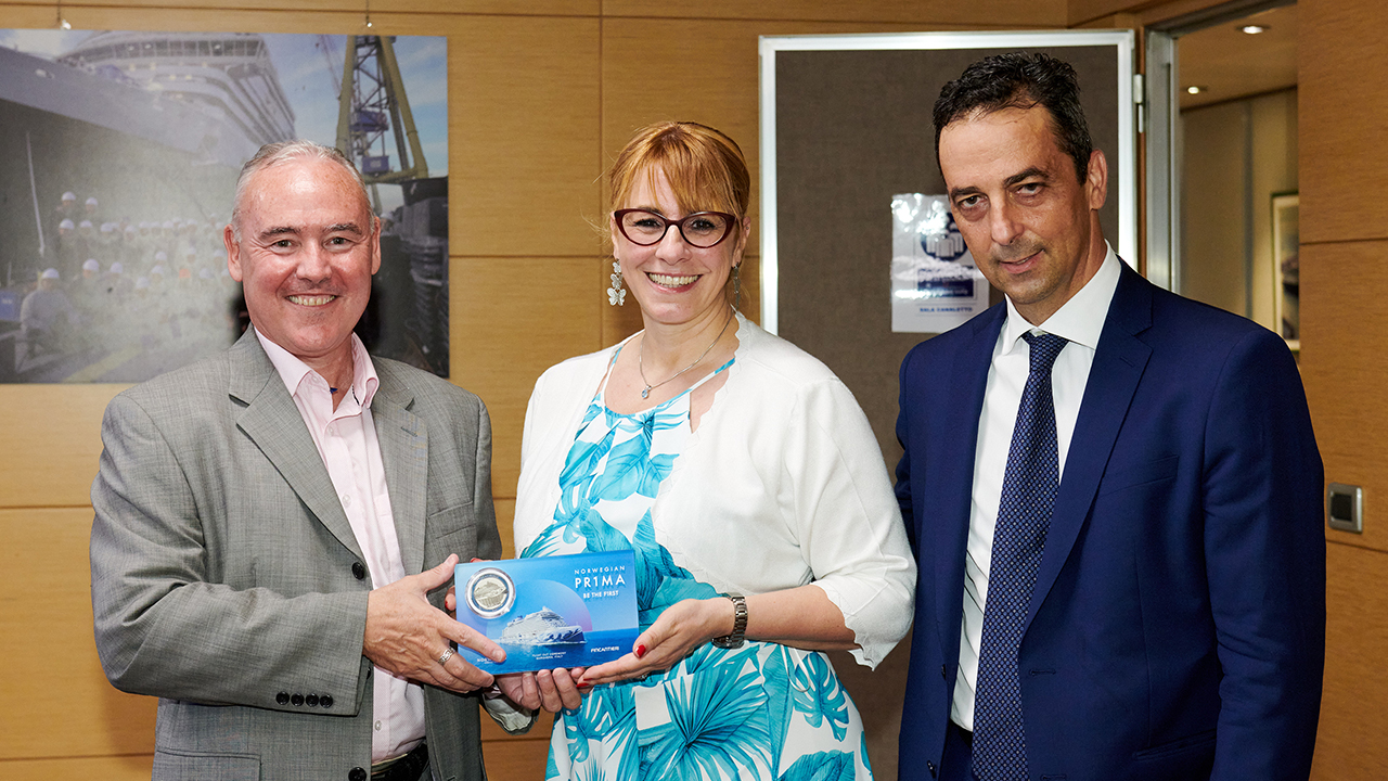 Eamonn Ferrin, Vice President of International Business of Norwegian Cruise Line, Tatiana Lazzarin, Shipyard Godmother and Head of Machinery Room Outfitting Technical Office of Fincantieri, and  Antonio Quintano, Fincantieri Marghera Shipyard Director, attend the traditional coin ceremony for Norwegian Prima, soon-to-be the newest ship in the NCL fleet. Photo by ©Filippo Vinardi