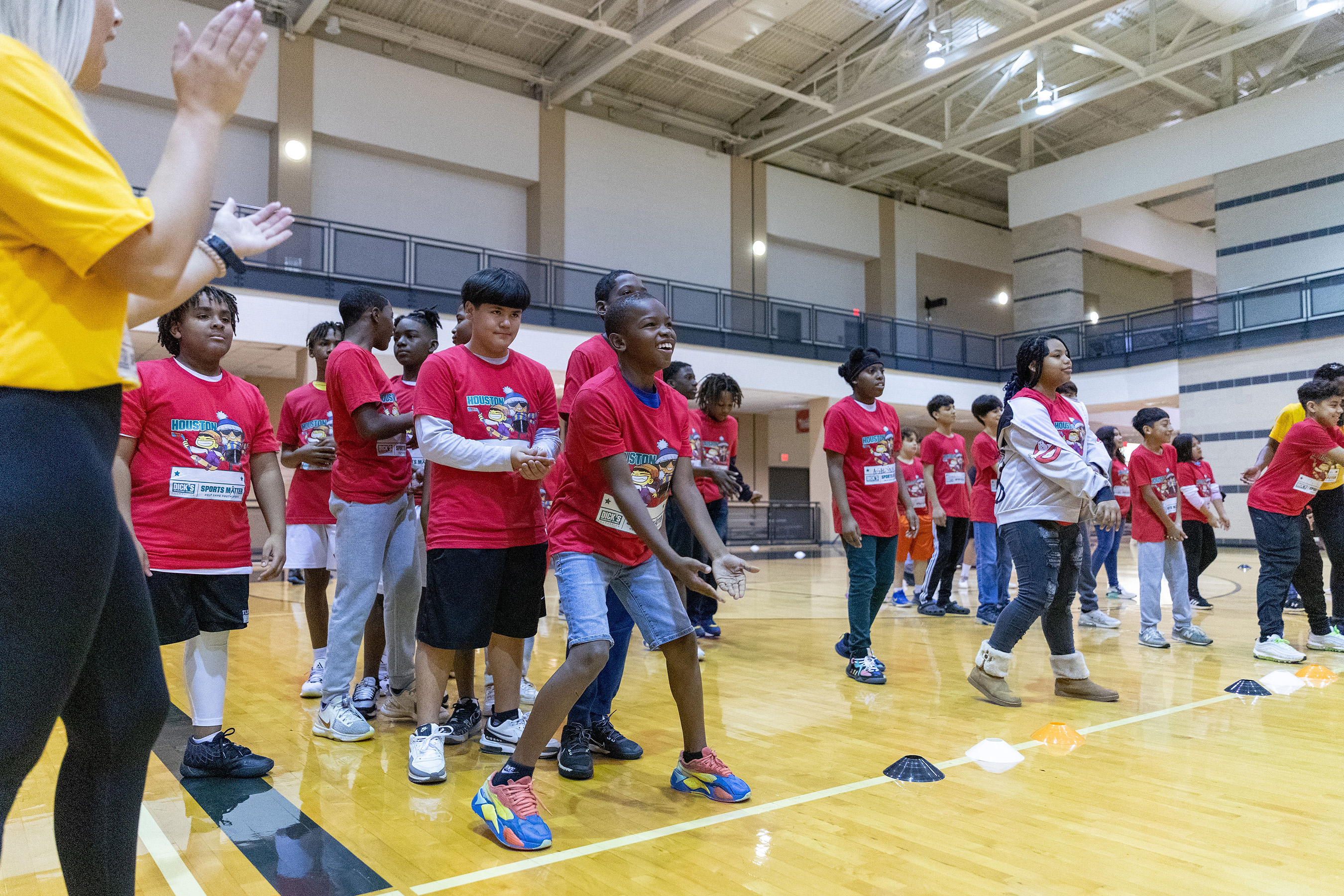 Athletes participate in volleyball station at Sports Matter Day Houston