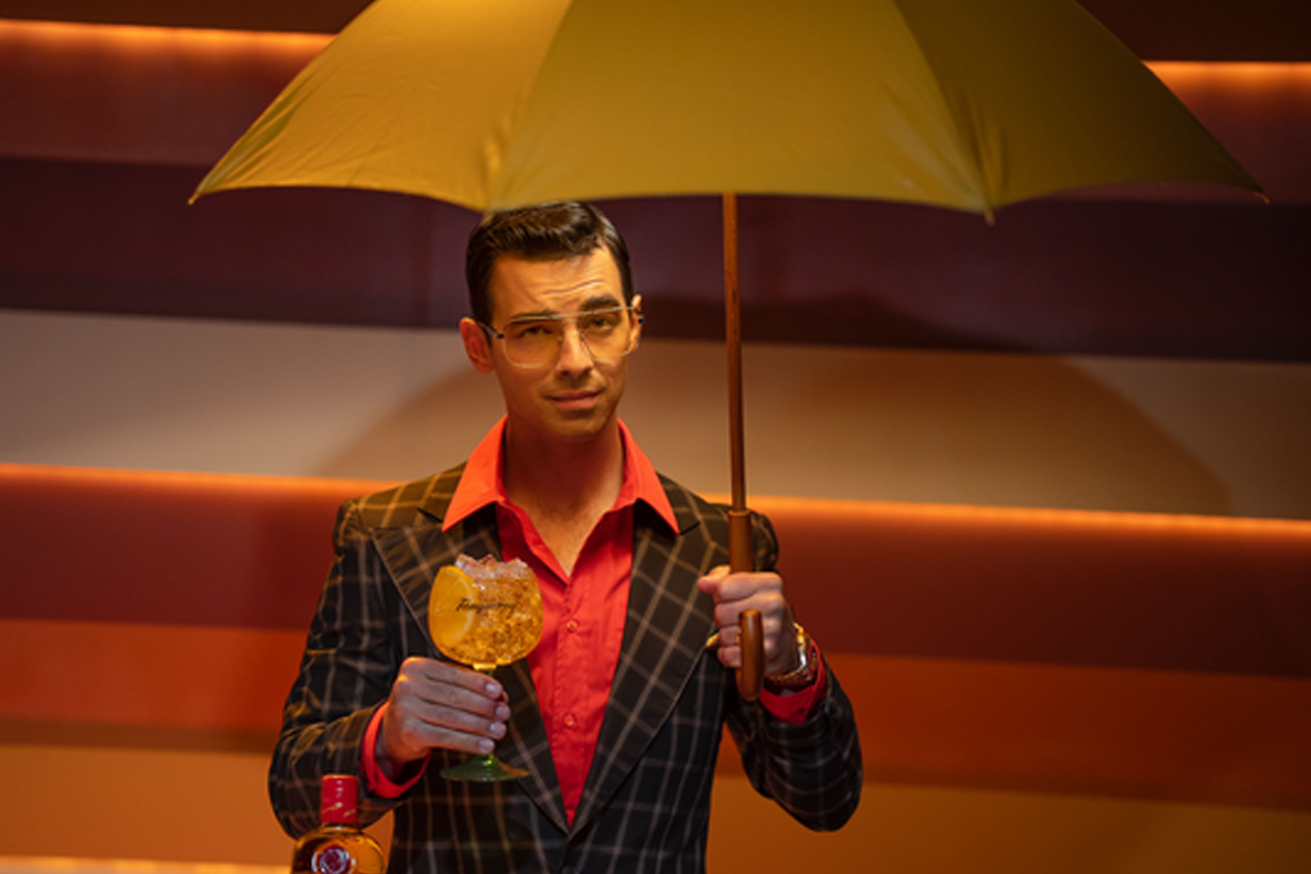 Joe Jonas posing with Tanqueray