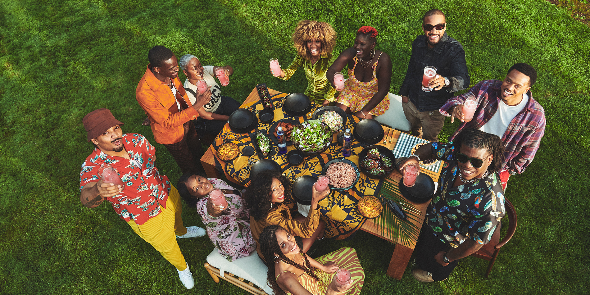 People toasting on the lawn