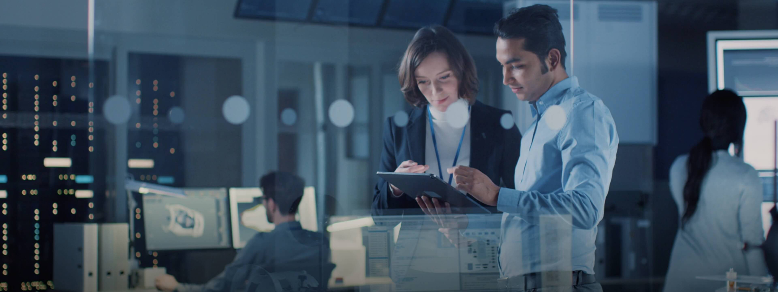 People reviewing data in an office.