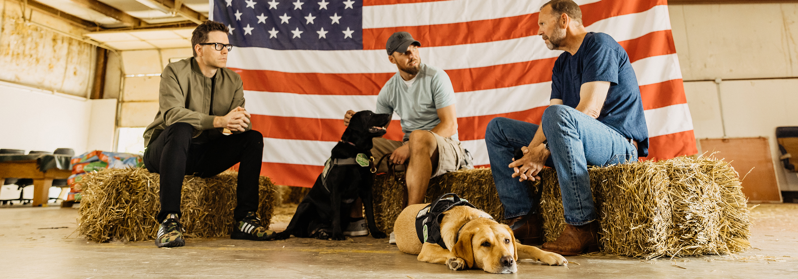 People sitting with a dog