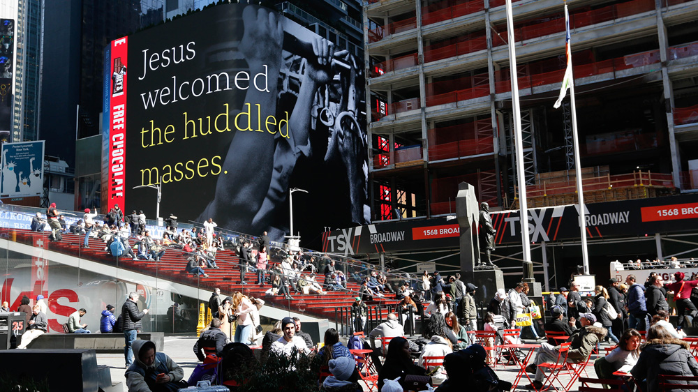 Times Square billboards surround ‘Huddled Masses’ in He Gets Us ad campaign