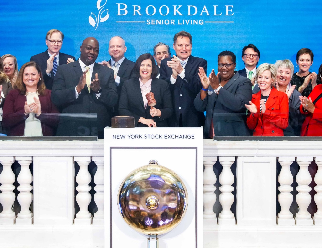 Cindy Baier rings NYSE bell on April 19.