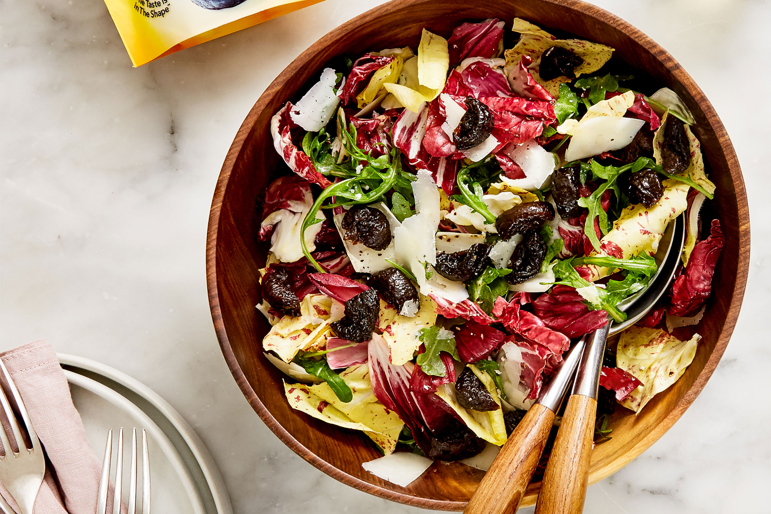 Mixed Greens Salad With Prunes and Pecorino