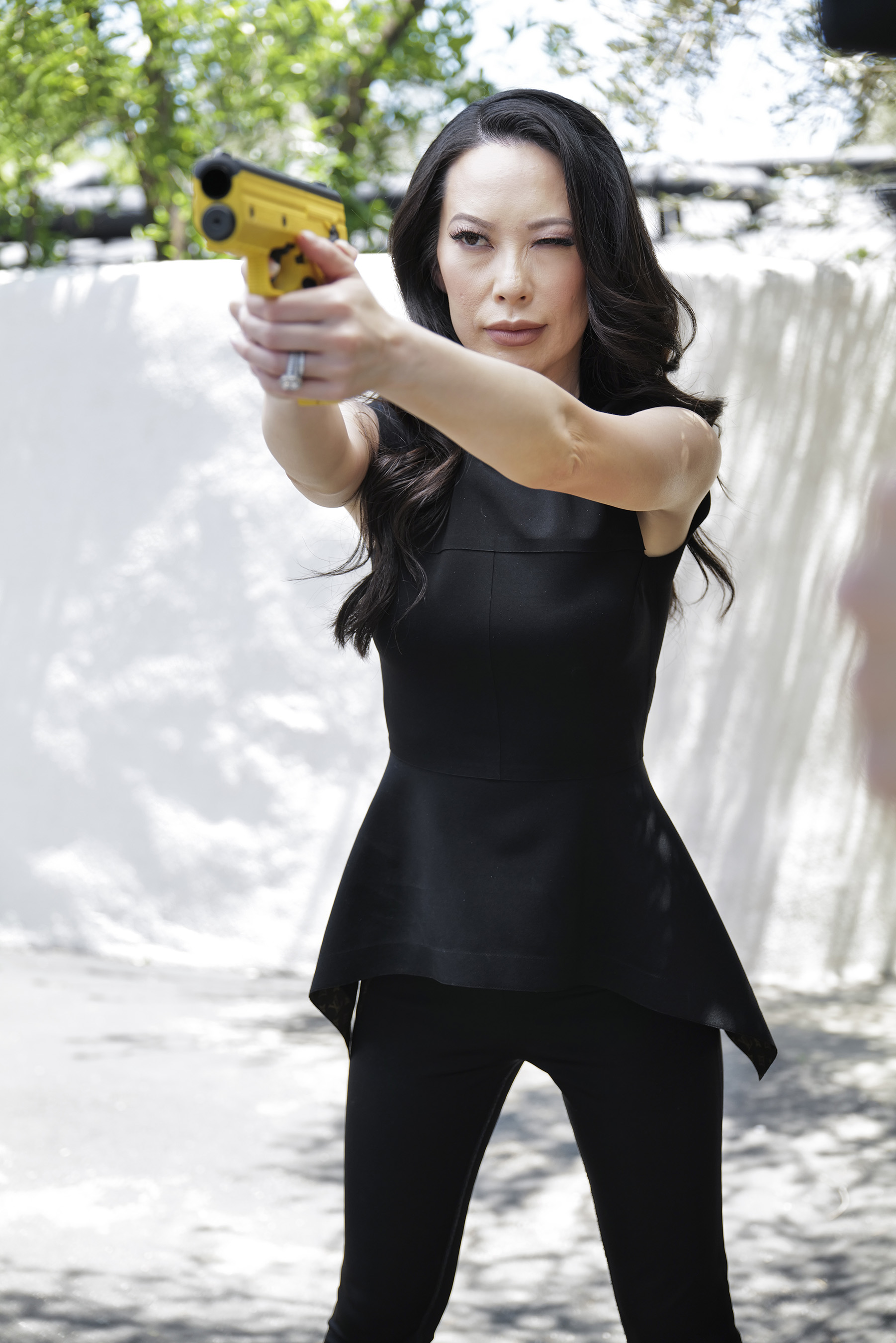 Woman practicing with gun